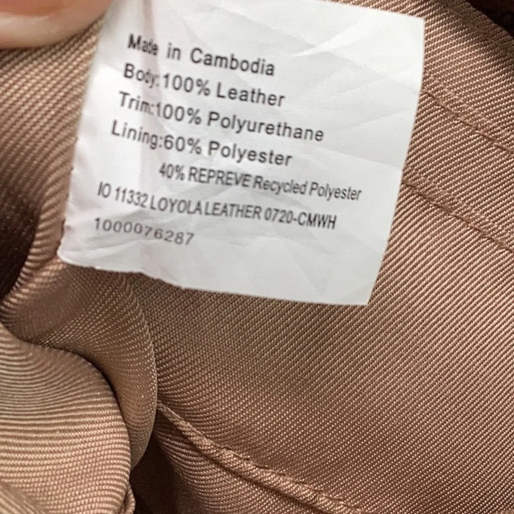 The Sak Leather Gray/ Green Embossed Leather Backpack